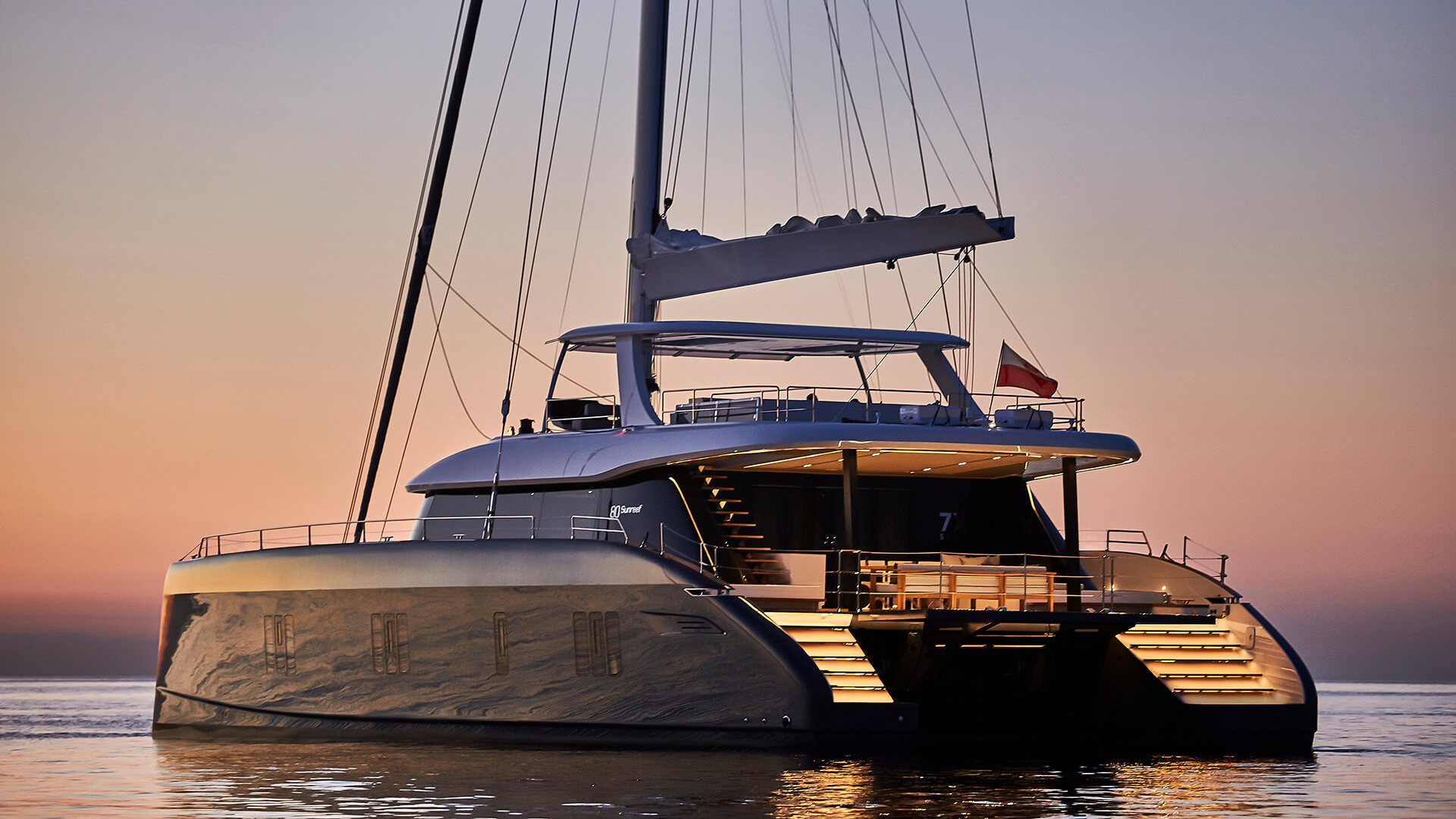 7x catamaran yacht charter side view