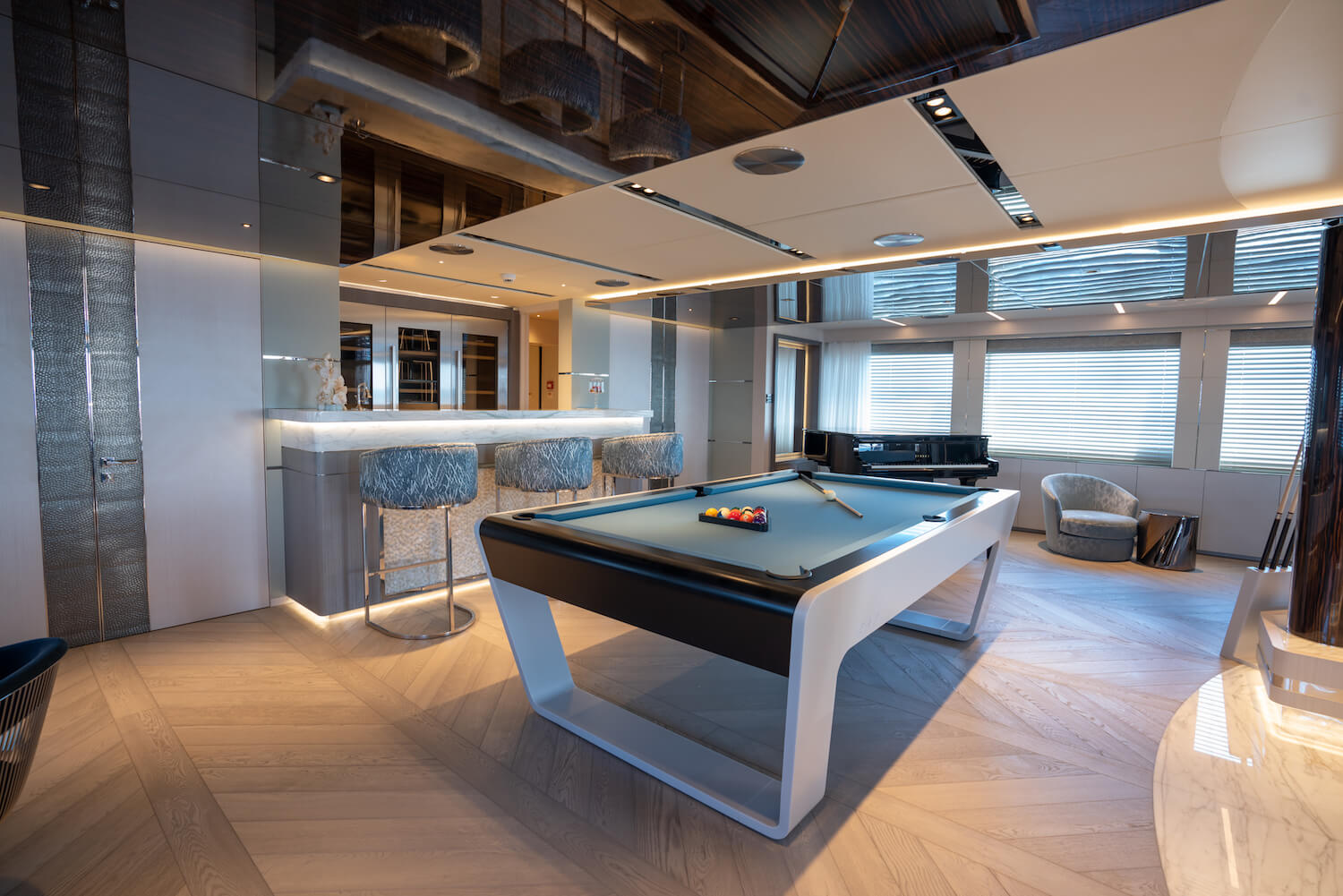 pool table and a bar inside a superyacht