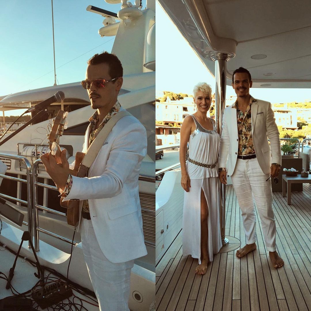 2 musicians playing on a yacht