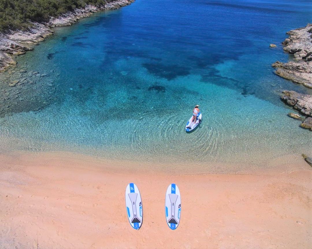 Yacht Charter in Brač paddleboarding in Šolta bay