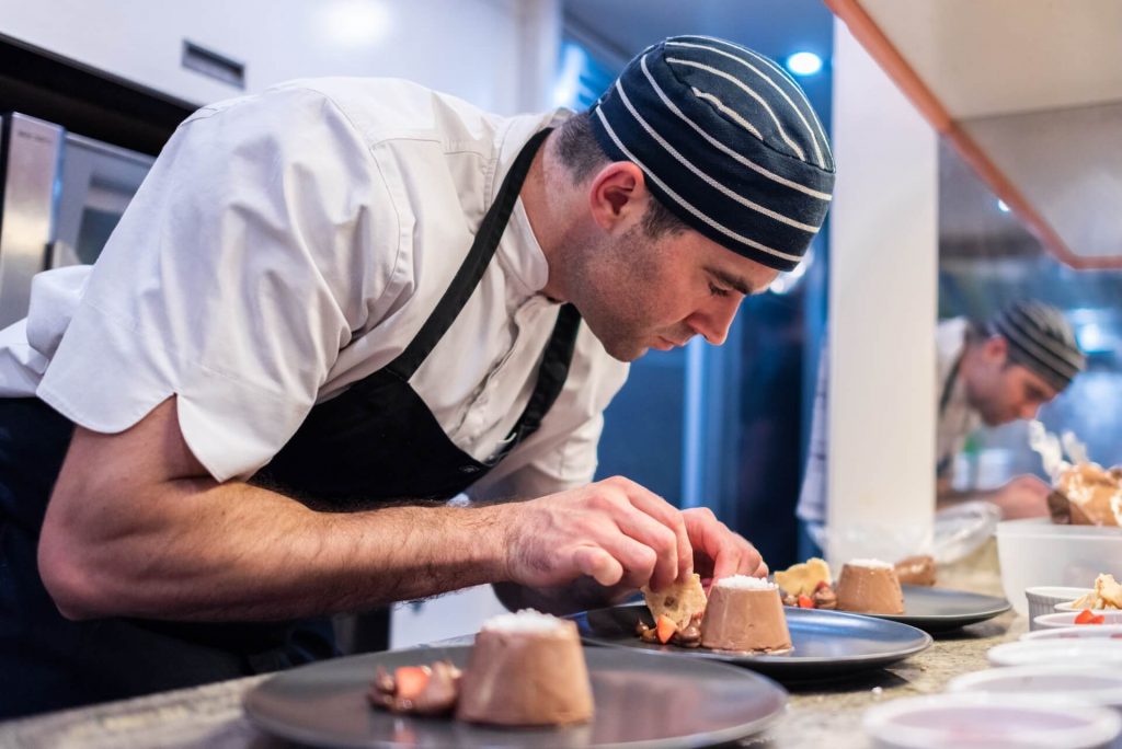 africa I yacht charter chef serving food