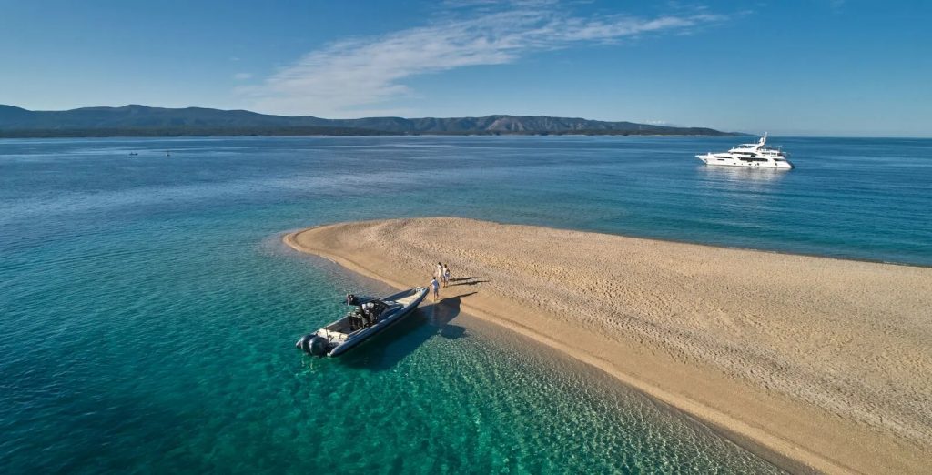 happy me yacht discovering beach