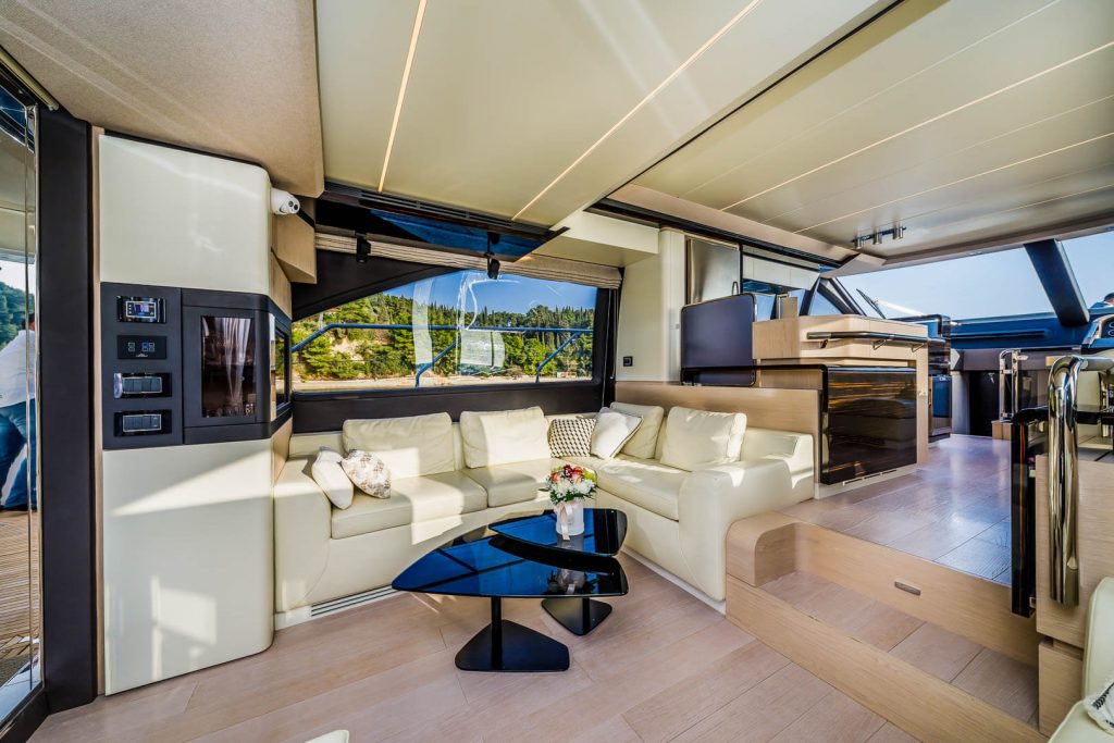 karat II yacht charter salon arean with a coffee table