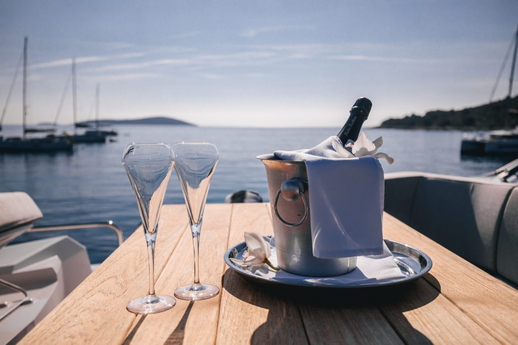 mowana yacht charter champagne on the dining table