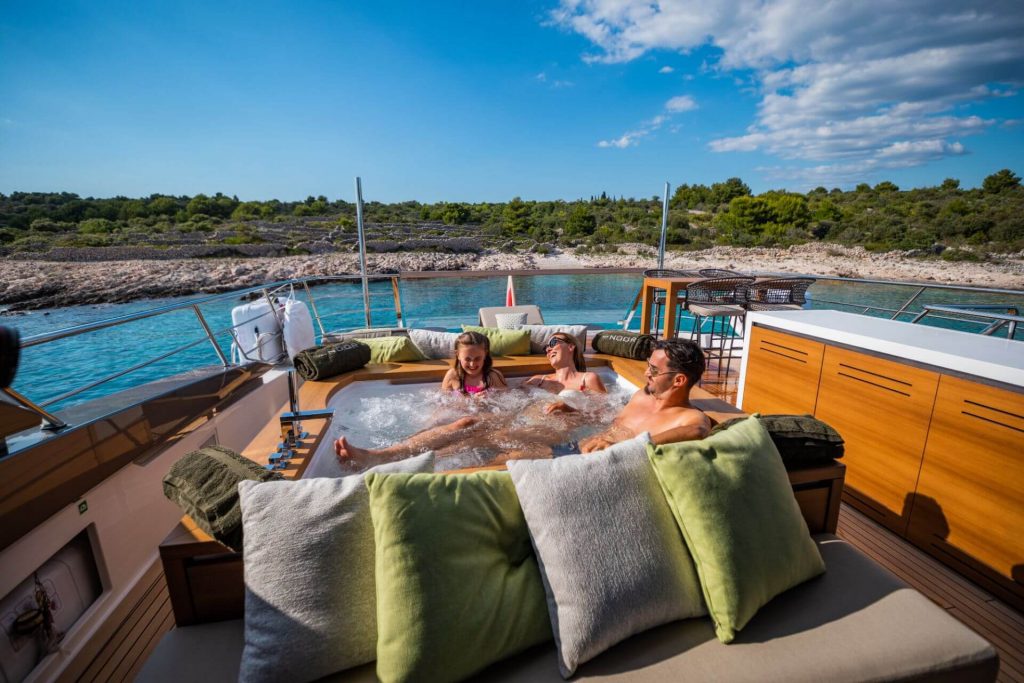 noor II yacht family relaxing in jacuzzi