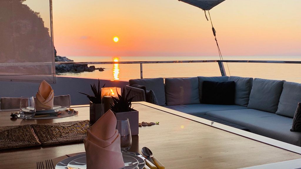 seven sins yacht charter sunset view