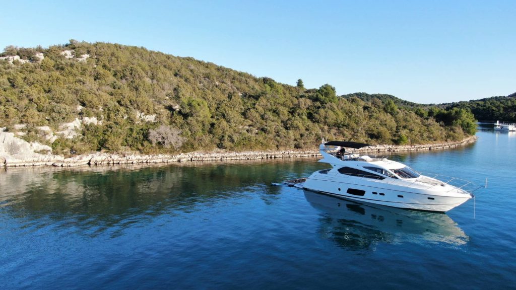 cardano yacht charter at anchor