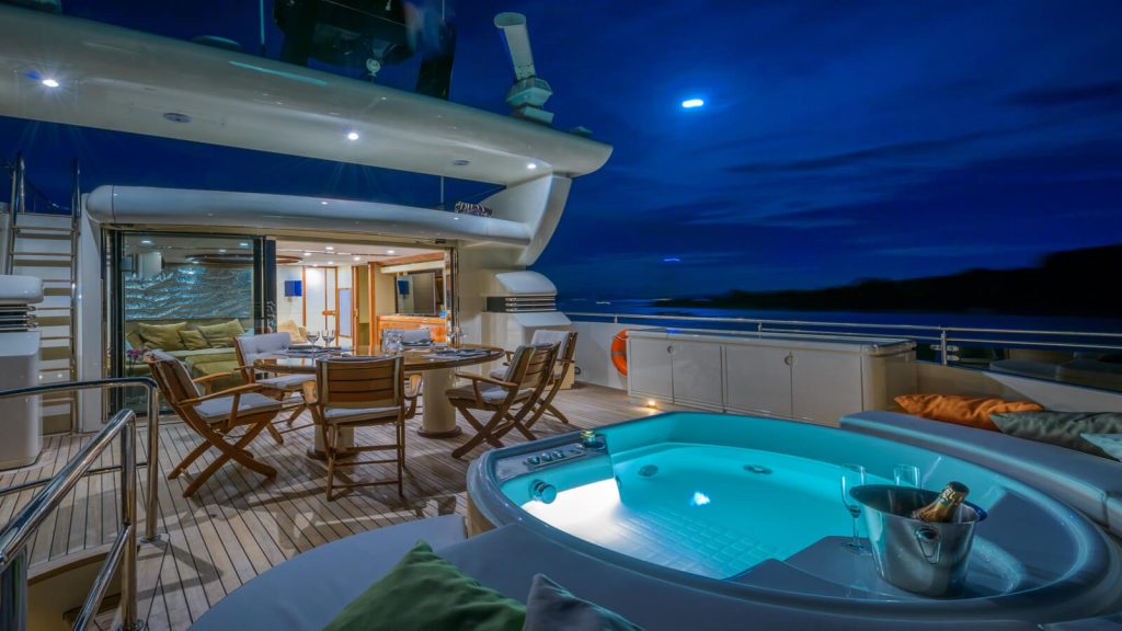 novela yacht charter deck jacuzzi in a night time