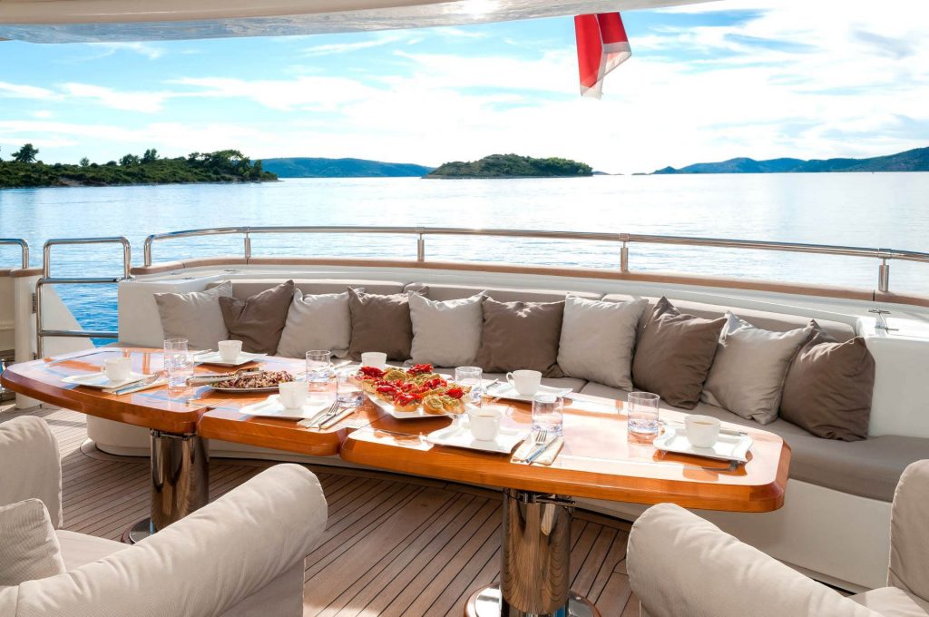 novela yacht charter outside dining area