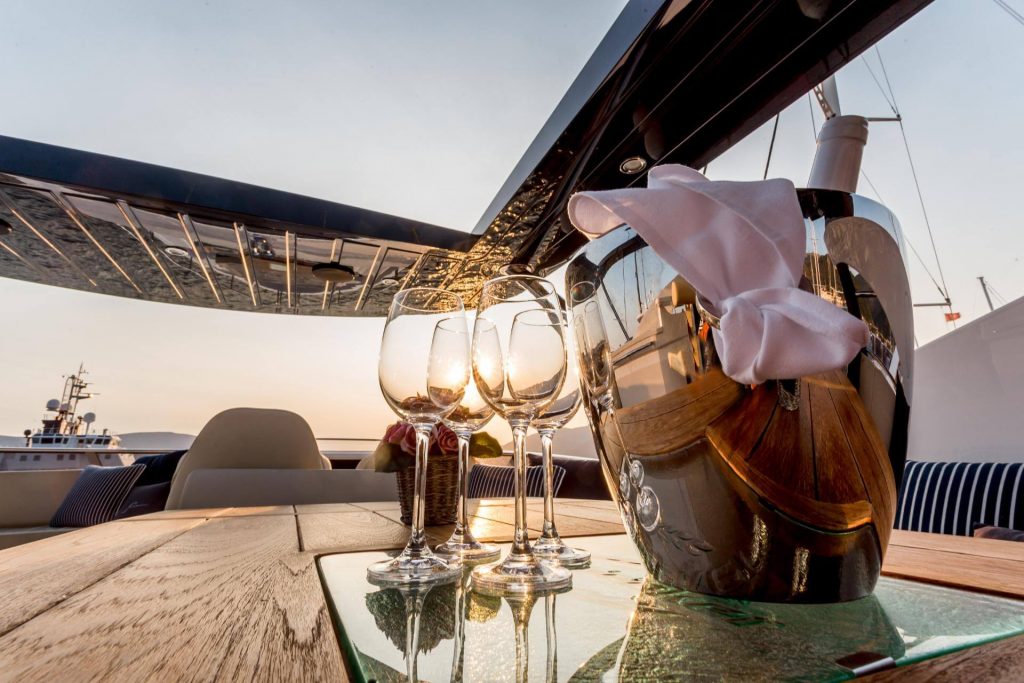 stardust yacht charter champagne served on the deck table