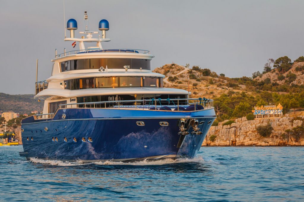 johnson baby yacht charter cruising in the sea front view