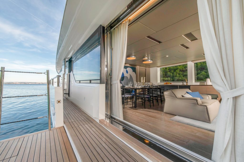 andiamo yacht charter main salon fold out balcony