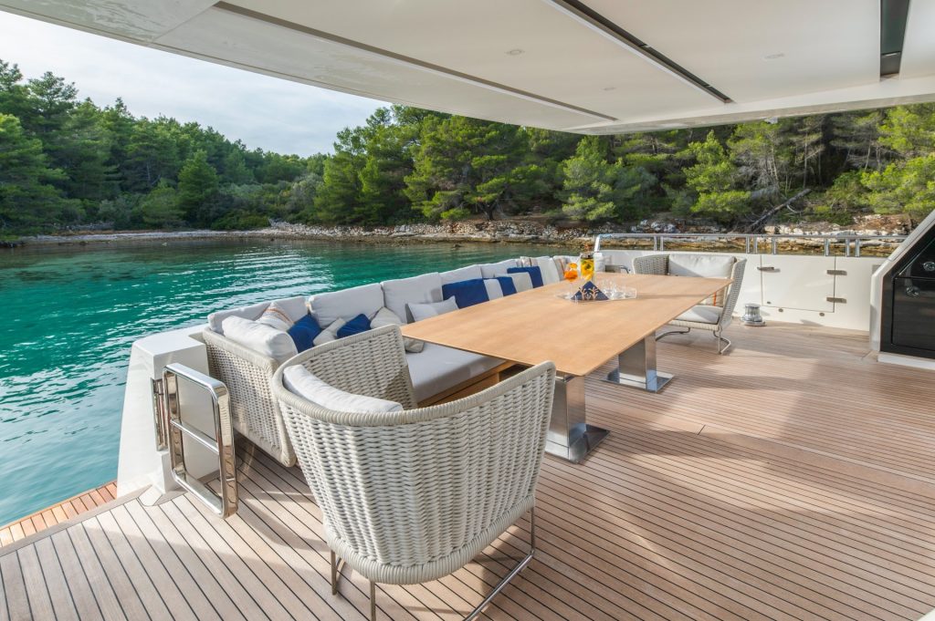 andiamo yacht charter aft deck dining table