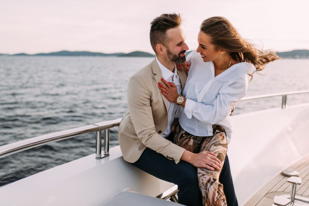 andiamo yacht charter couple sitting on yacht deck