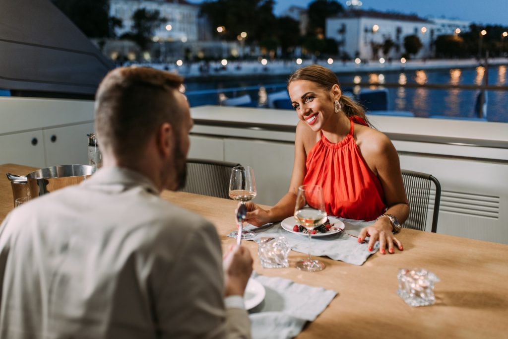 andiamo yacht charter lady smiling during yacht dinner