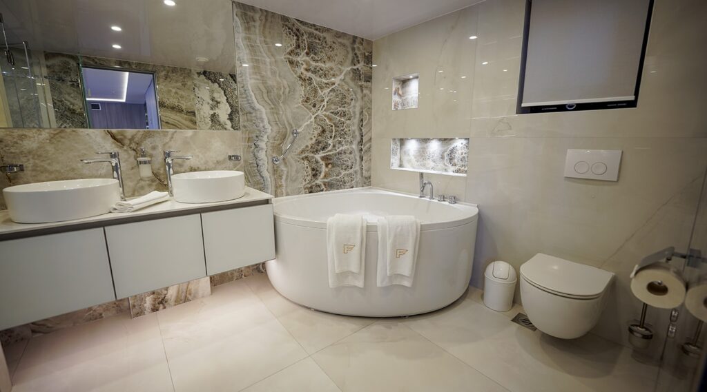 bathtub, double sink in the master en suite