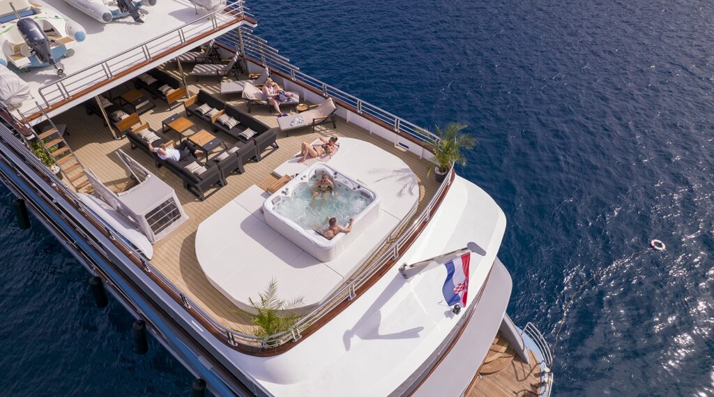 sundeck aft with jacuzzi lounge, seating areas & sun loungers