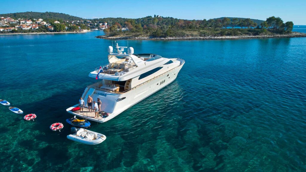 rear view of a yacht with guests on board