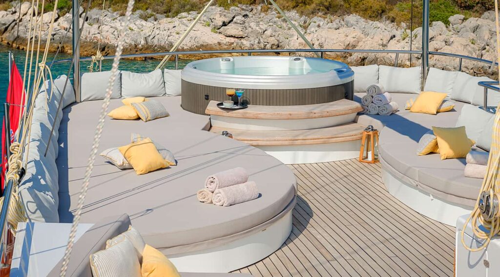 jacuzzi and sunbathing pads on the lady gita sundeck