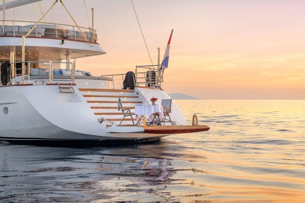 romantic dinner table onboard lady gita swimming platform