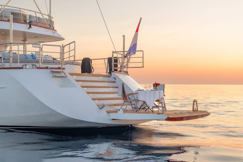 dinner setup for two onboard lady gita swimming platform