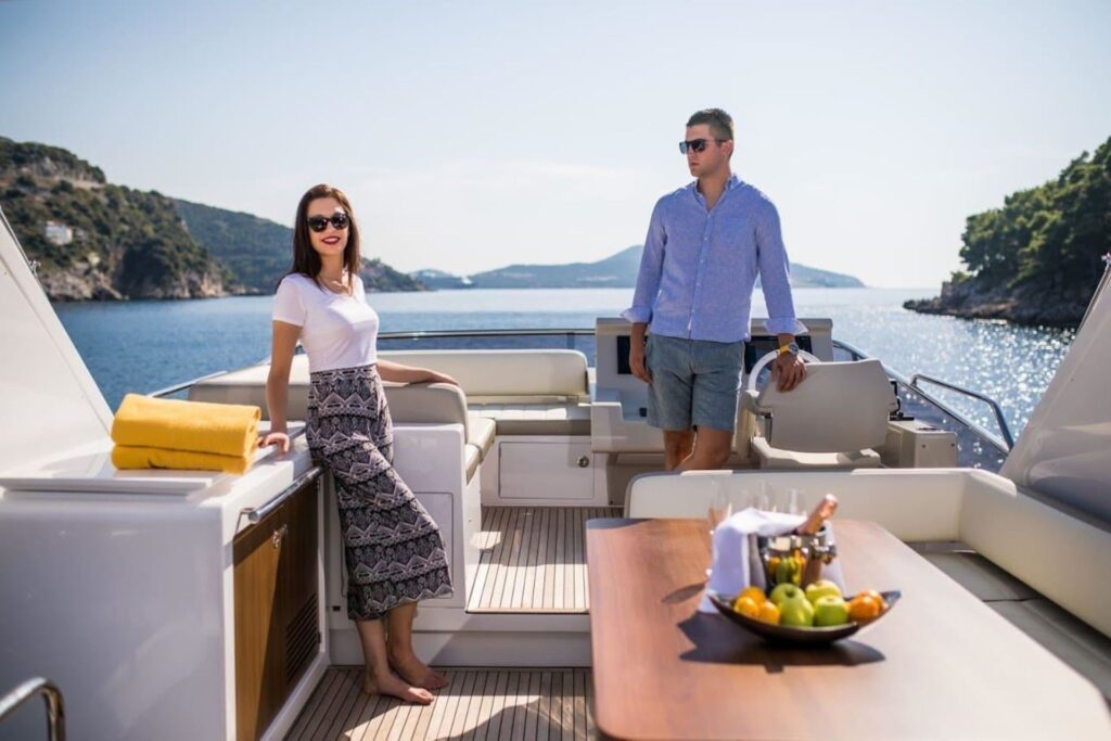 tamara ii yacht charter couple on a flybridge