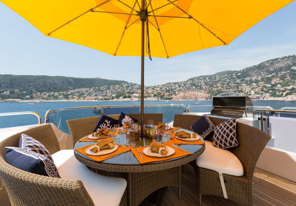 round dining table on the bina yacht sundeck