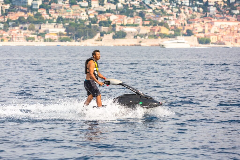 man on a stand up jet ski