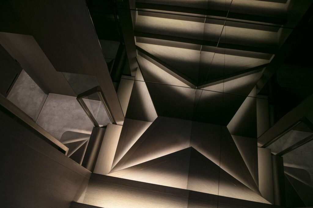 lighted stairway leading towards the yacht lower deck