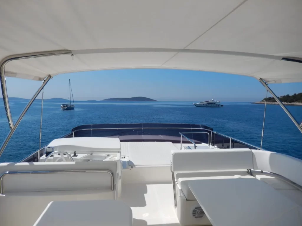 amy yacht charter flybridge front helm area