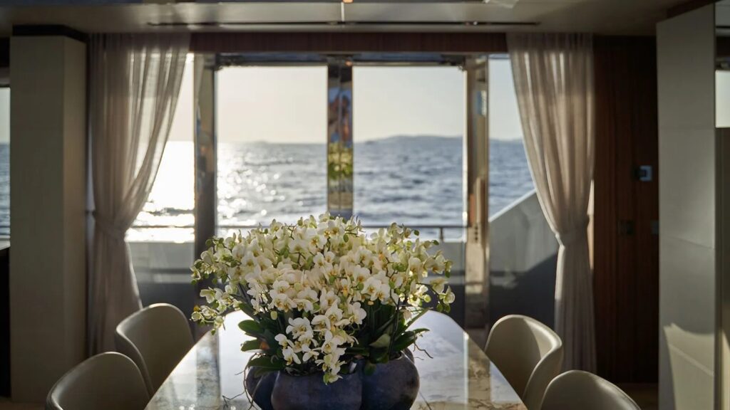 Nikita Yacht Charter dining area sunset view